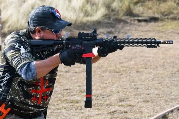 3 gun competitor using the lightweight carbon fiber handguard during competition.