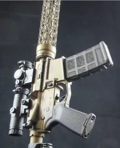 ar15 rifle with gold cerakote and carbon fiber handguard