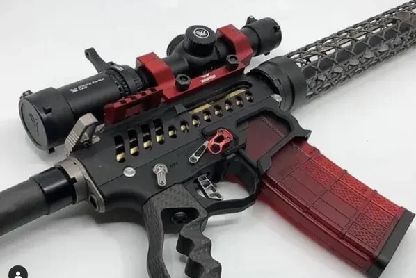 ar15 rifle, matte black, carbon fiber handguard, red highlights